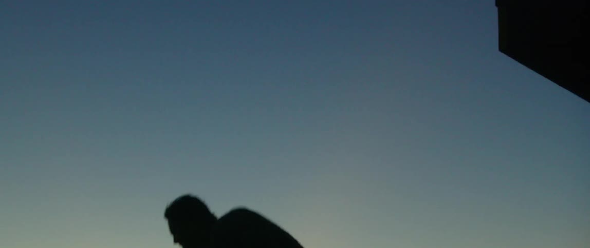 A man jumping off a ledge
