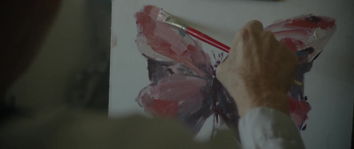 Old Man In House Writing And Painting