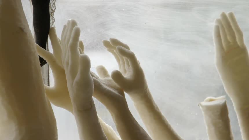 A pile of hands carved from foam