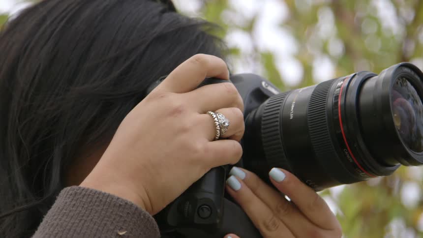 A woman is taking pictures