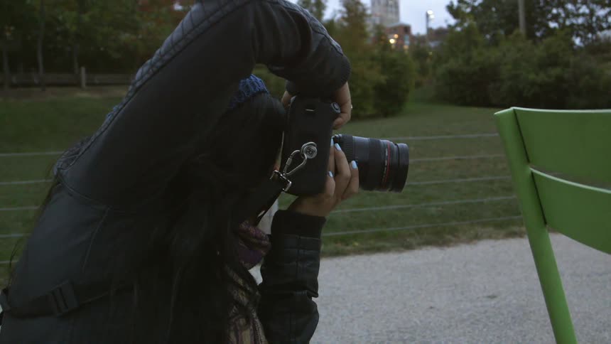 A woman is taking pictures