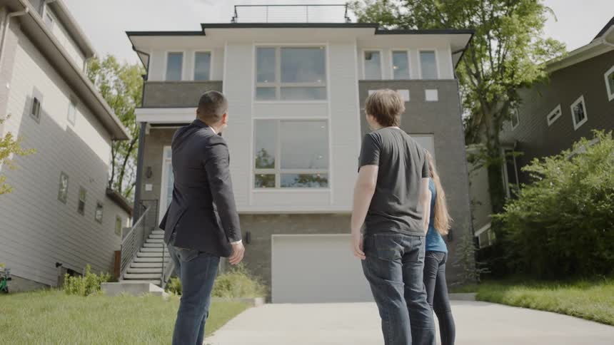 Realtor Showing Couple House