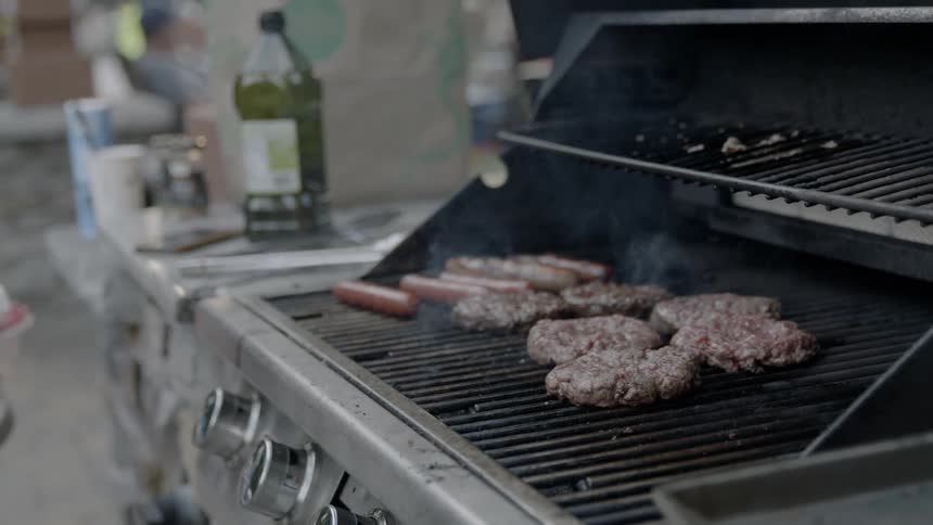 Meat smoking on a grill