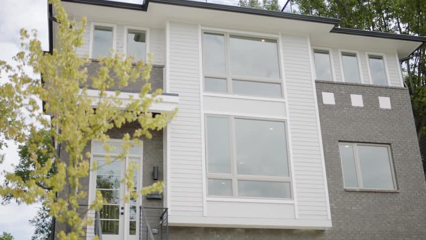 A house is up for sale in a neighborhood