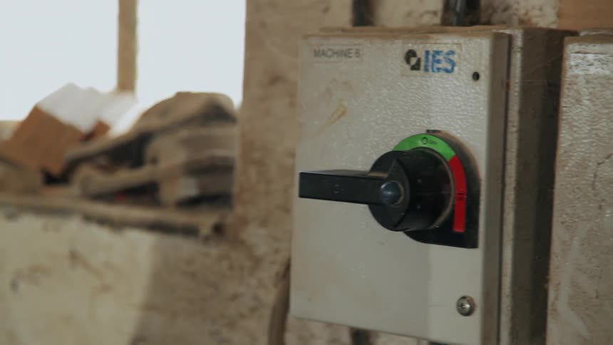 A person turning a dial