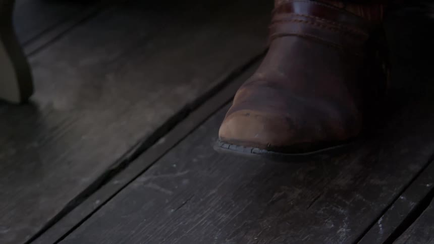 A person tapping their foot