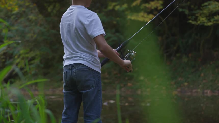 Person fishing in a river