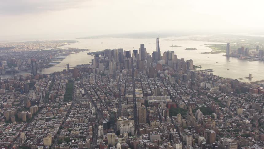 Fog is rolling over the city on a cloudy day