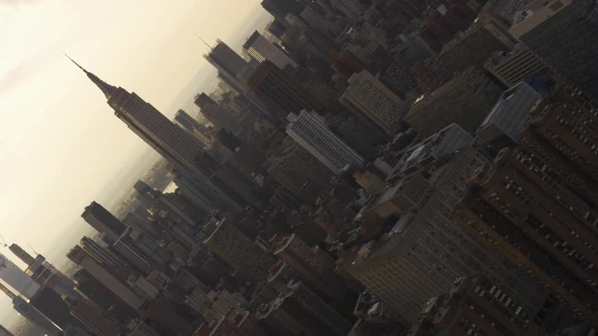 A city stretches out over the horizon on a foggy day