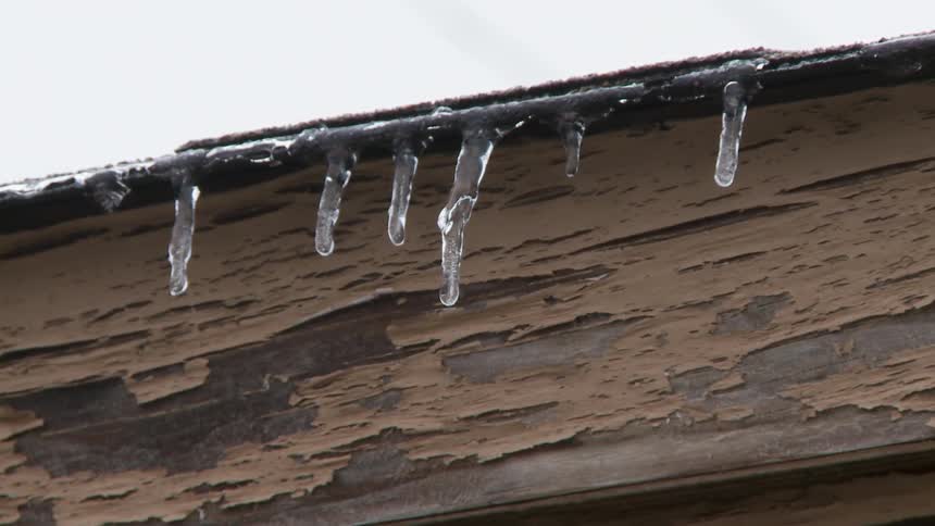 Icicles hanging from a roof