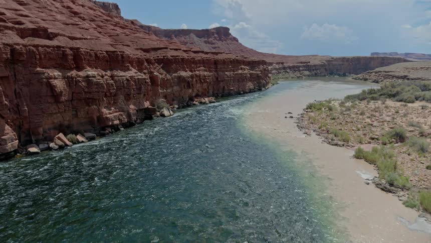 Aerial view of river flowing through desert