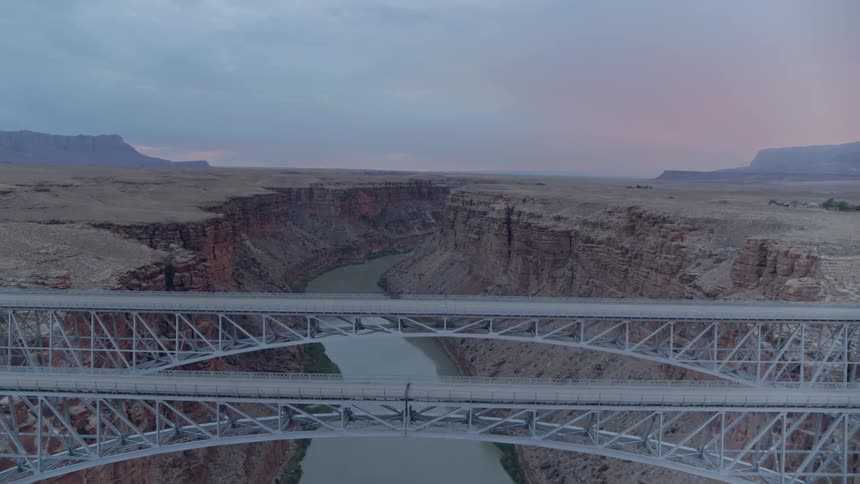 A bridge is connecting two sides of a mountain