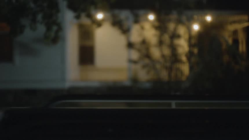 Old man drives truck away from haunted house