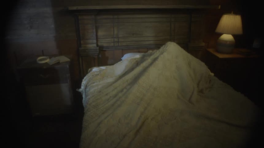 Little boy running to hid in his bedroom in haunted house