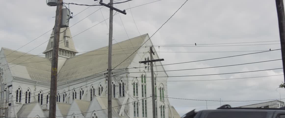 Power lines cover the area by a church