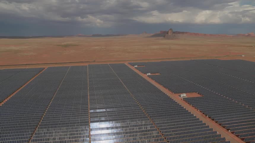 The solar farm is in the middle of the desert