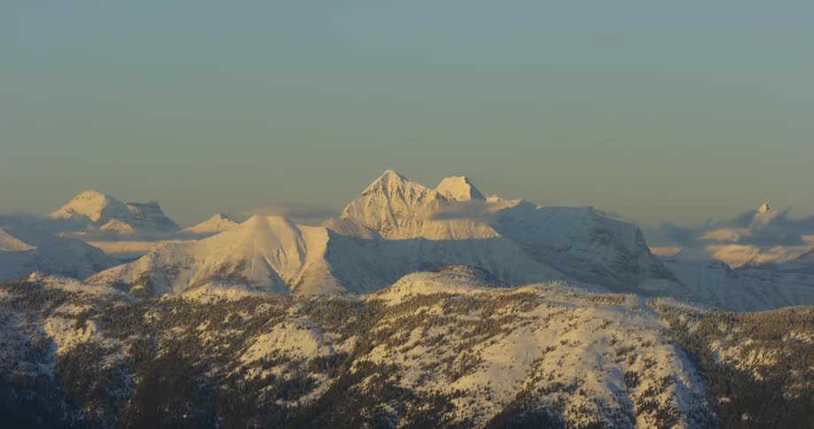 Snow covers the mountain landscape