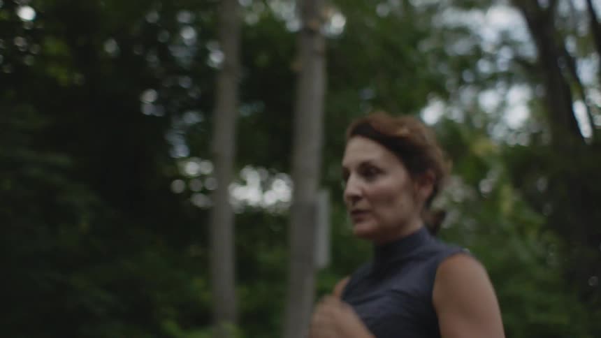 A woman jogging in the street