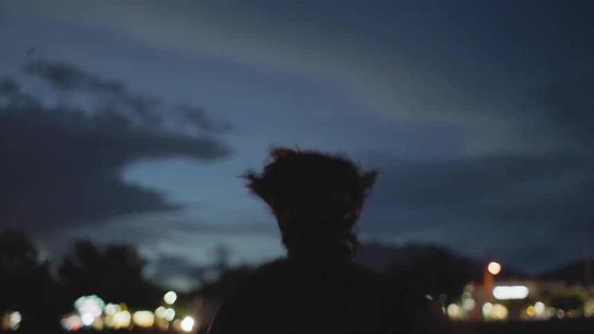A woman running in the night