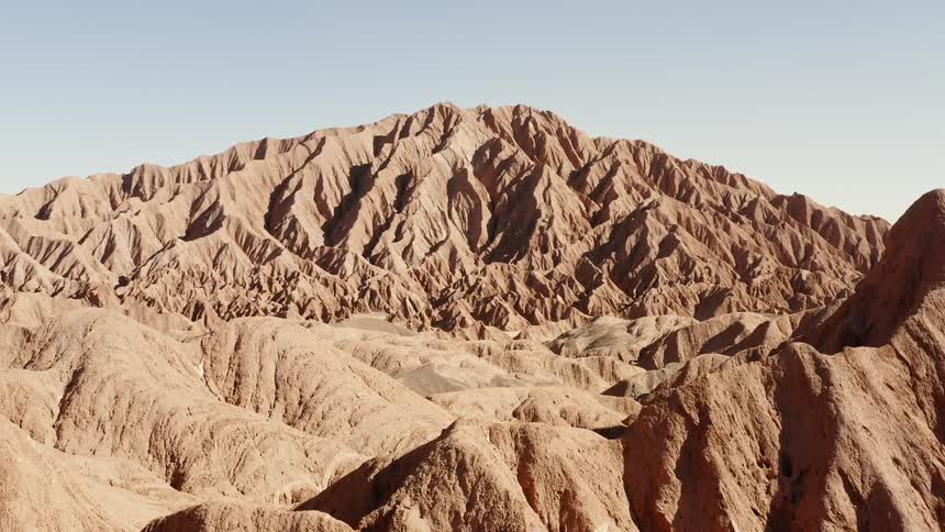 The mountain has many edges on a sunny day