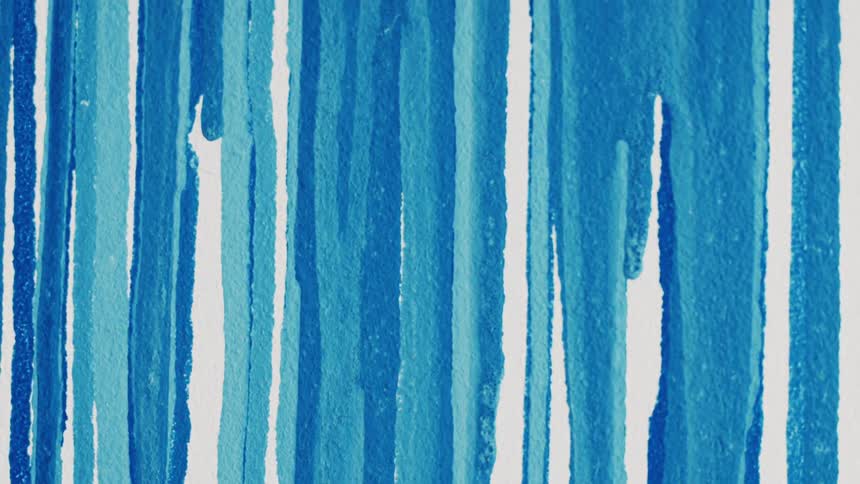 Varying shades of blue stripes painted onto a canvas