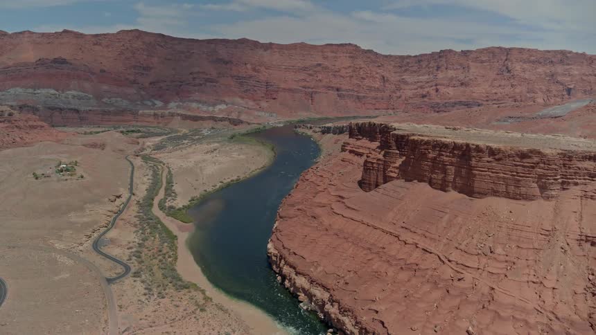 A creek is along the cliffs
