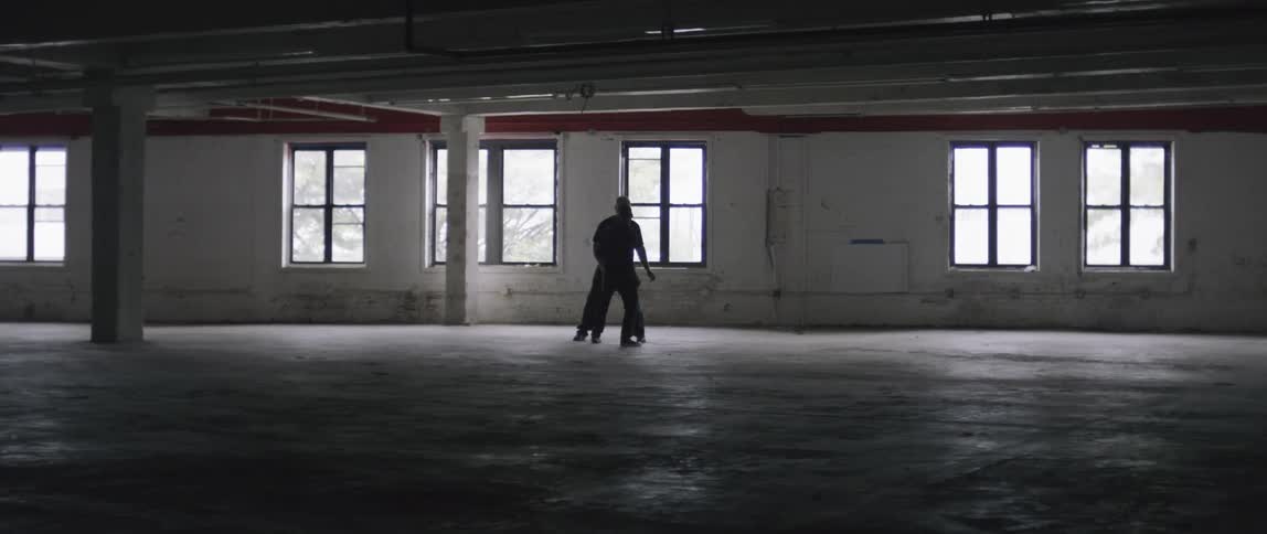 Two people fight in the building