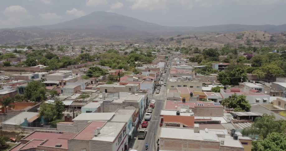 Rooftops with a mountain in the distance