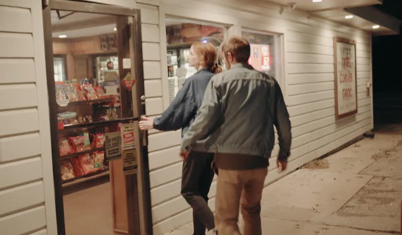 A man and woman enter the store together