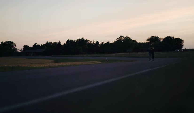 Man Woman Walking On Road