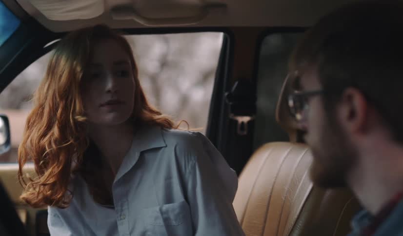 Man And Woman Talking In Car