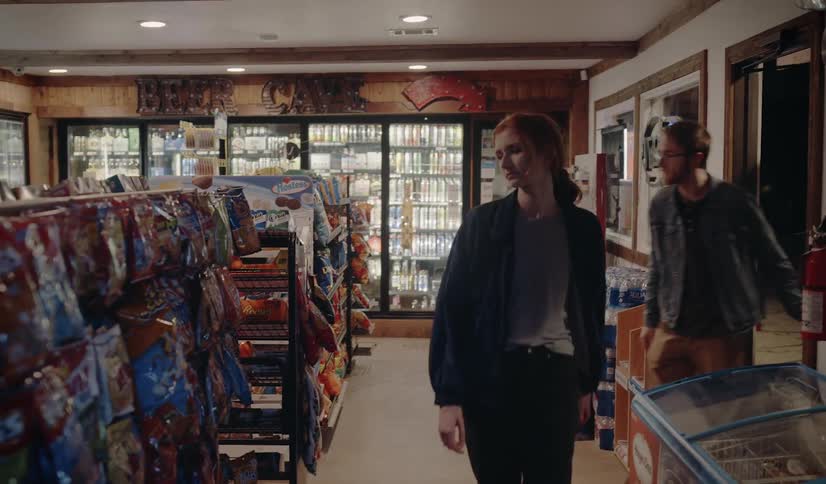 People enter the convenience store to shop