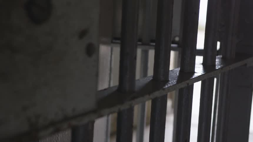 Prison cell door and surrounding structure