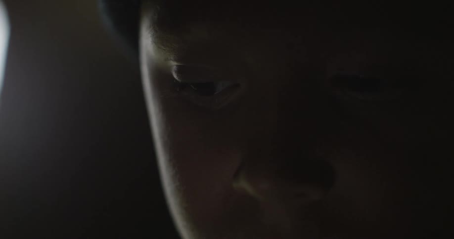 The eyes and nose of a child's face