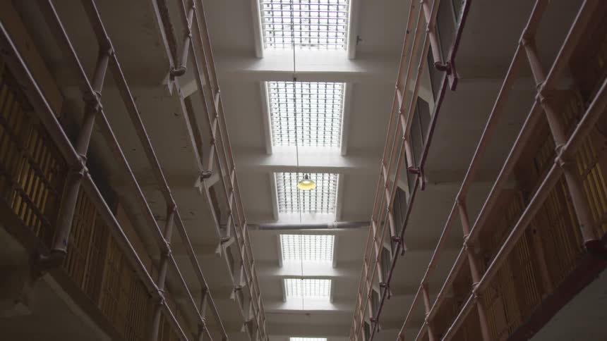 Light is shining on the ceiling of a building