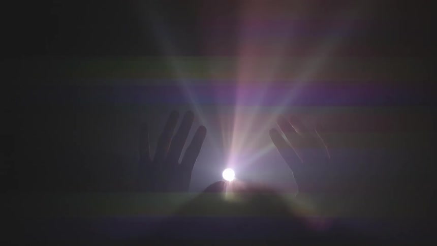 Video projector shines through raised hands