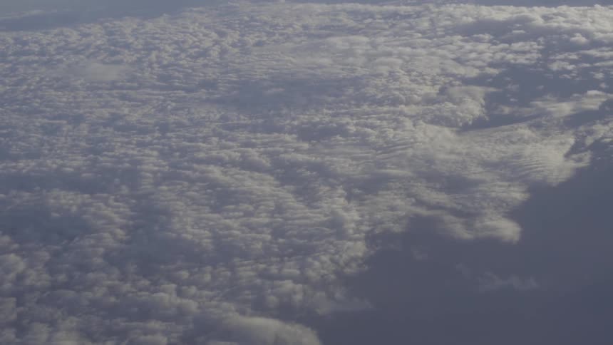 An aerial view of many clouds in the sky