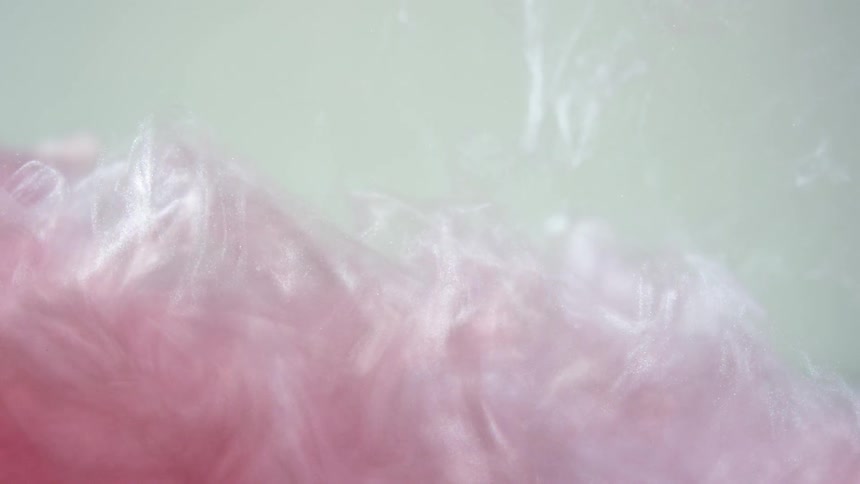 A pink abstract design is displayed