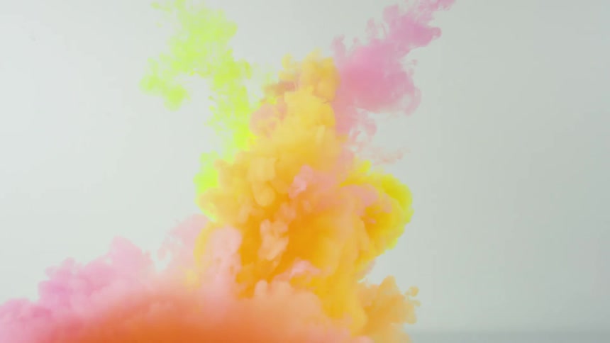 A yellow and pink stream mixing together