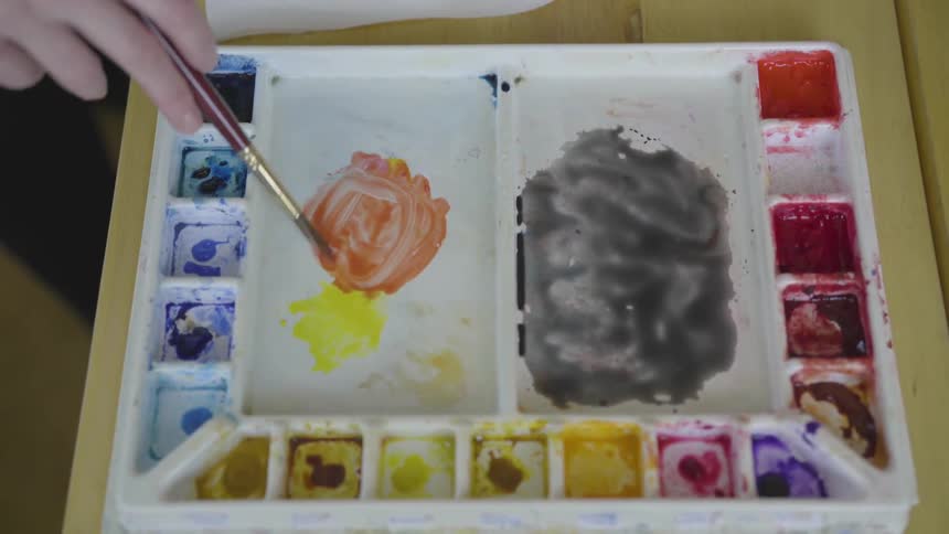 Artist plays with some watercolors