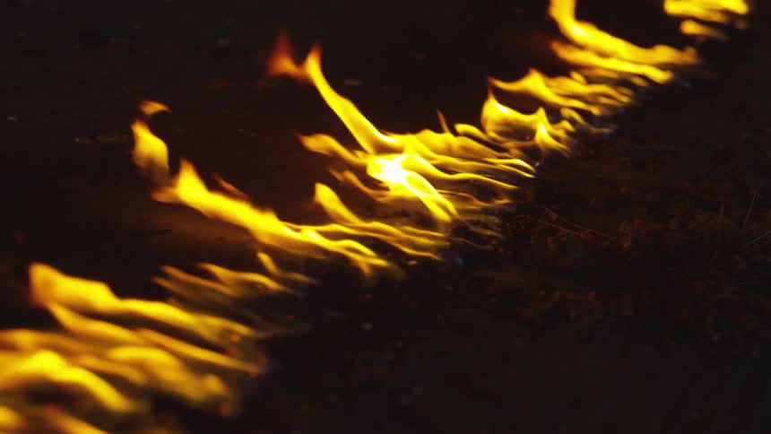 Abstract People Burning Various Objects In Warehouse