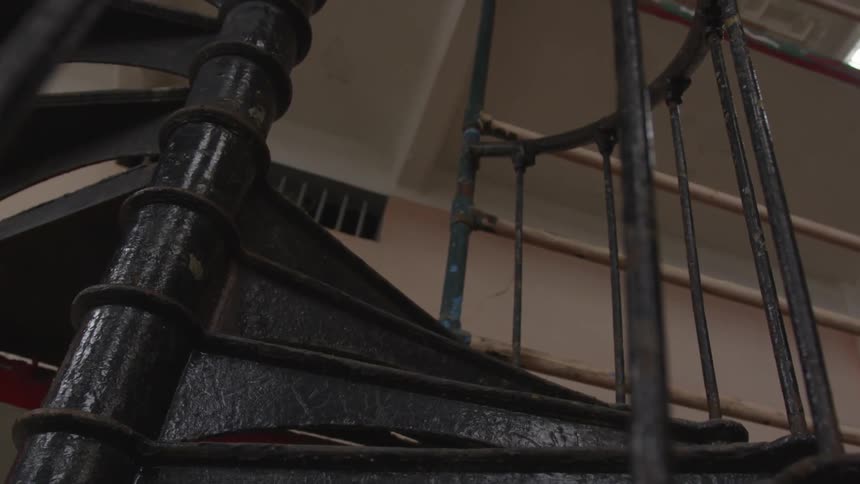 The spiral stairwell is empty
