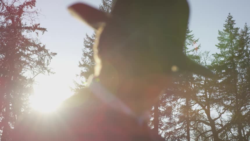 A person is wearing a hat outdoors