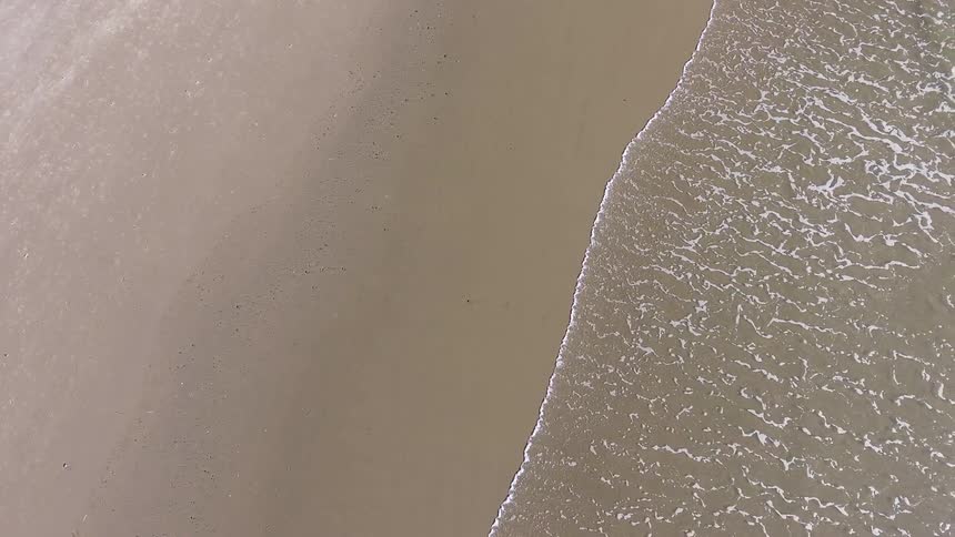 Waves hitting a beach