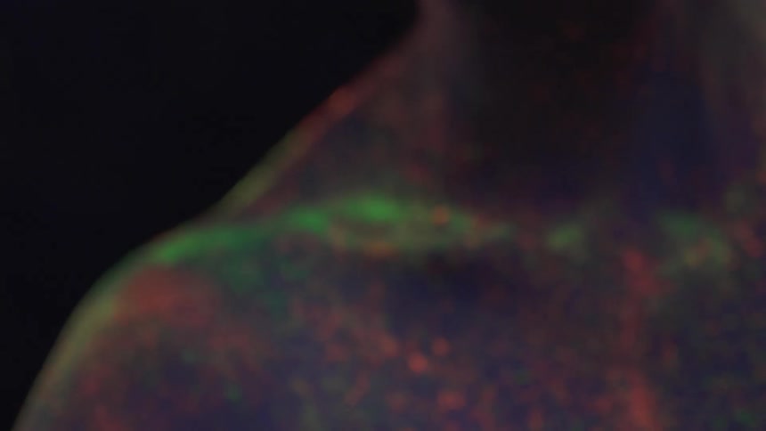 Person illuminated by lights moves around