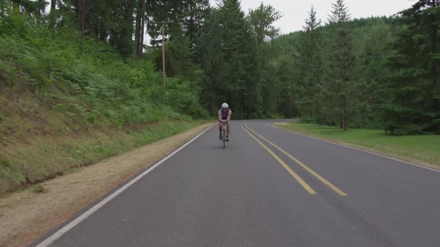 Man Cycling Outdoors