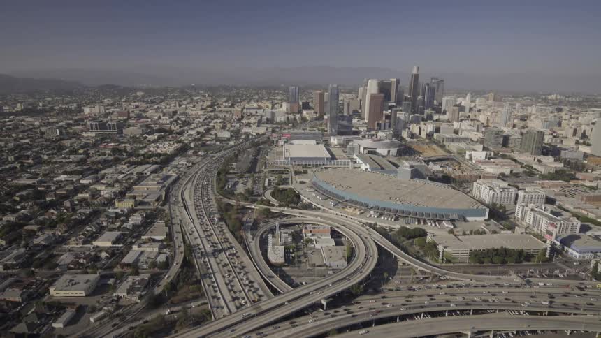 Traffic moves on the large highway system of a city