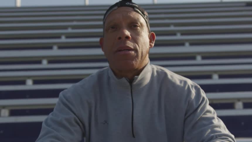 Man Exercising At Stadium