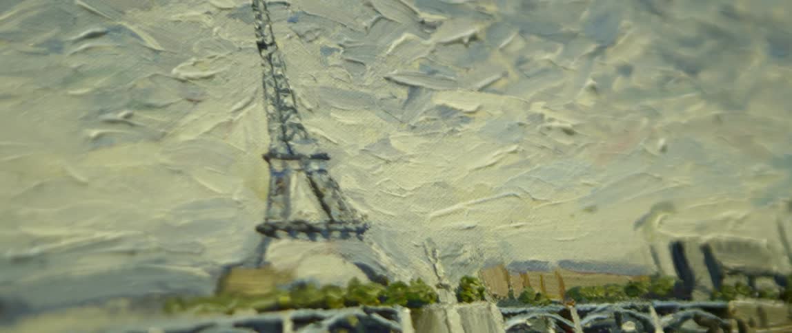 A close up look of an acrylic painting of an eiffel tower