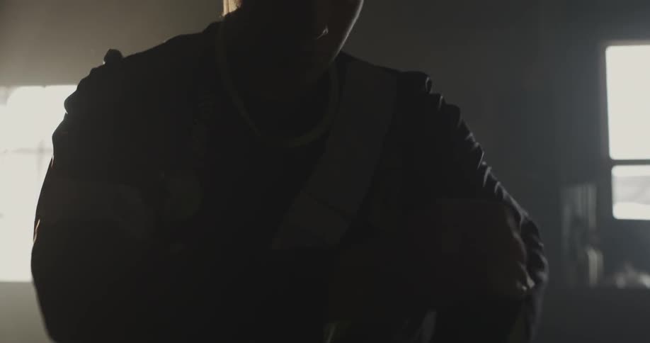 Man putting on a shirt